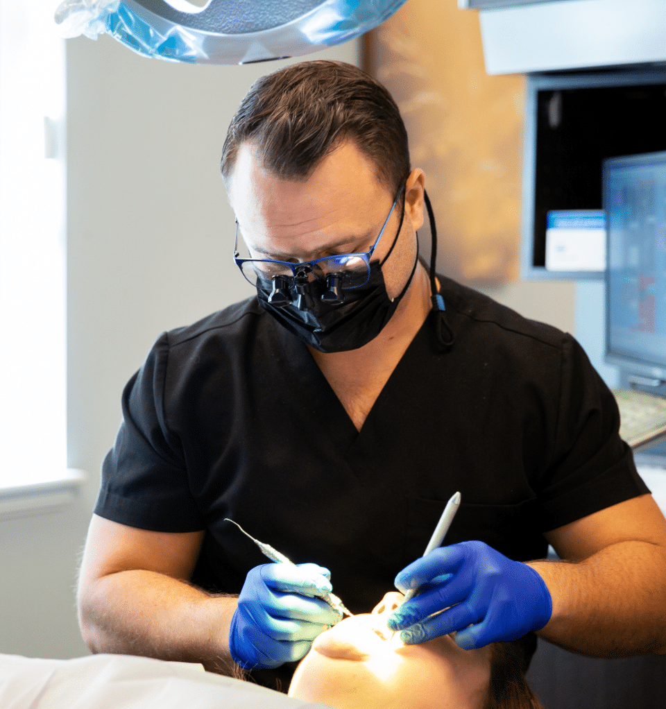 Dr working with teeth at rother dental