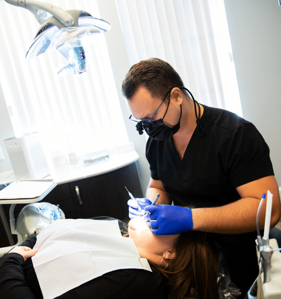 Dr rother working on teeth at Rother Dental in Mechanicscburg